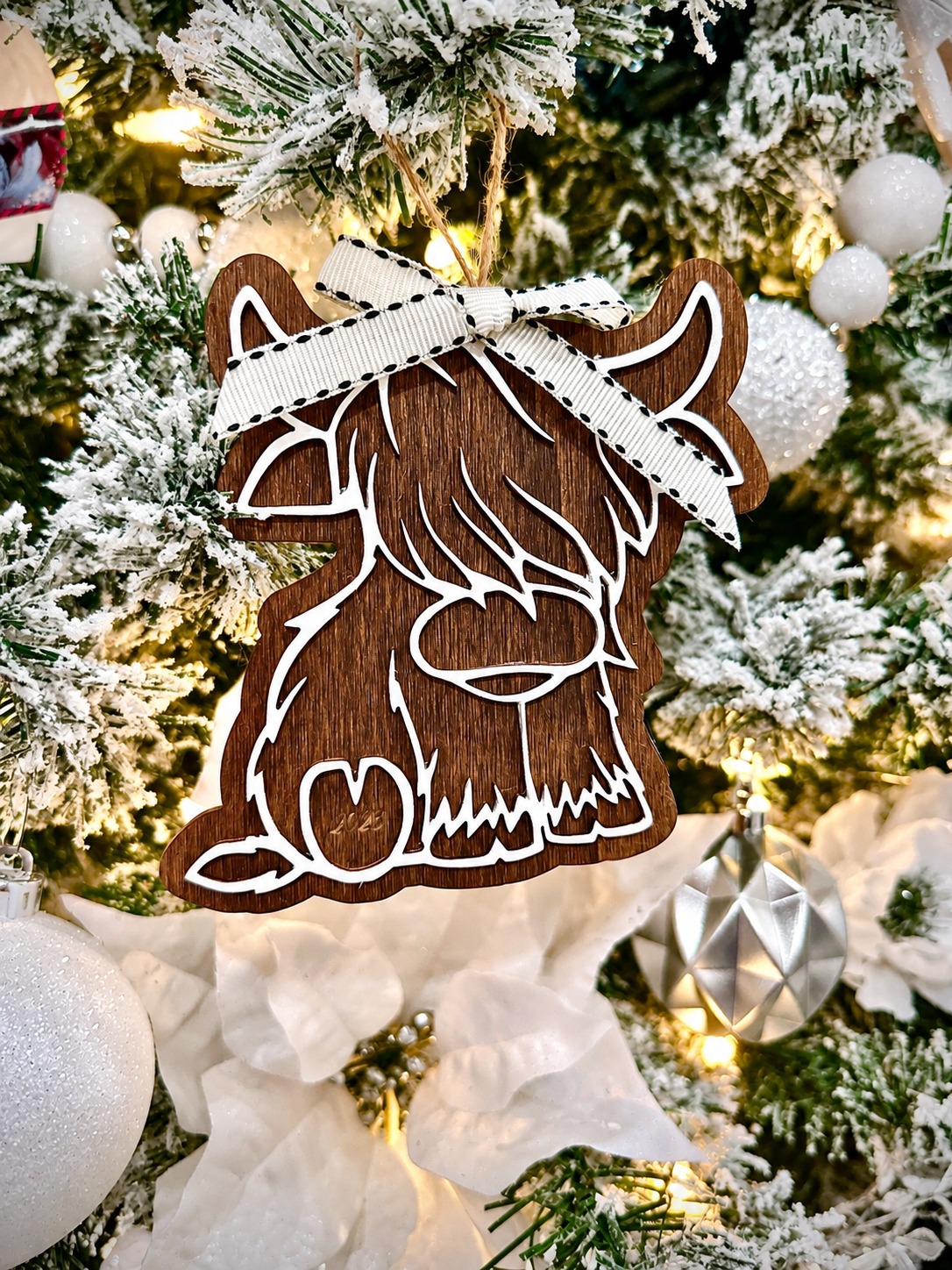 Wooden Highland cow ornament with white layered detail