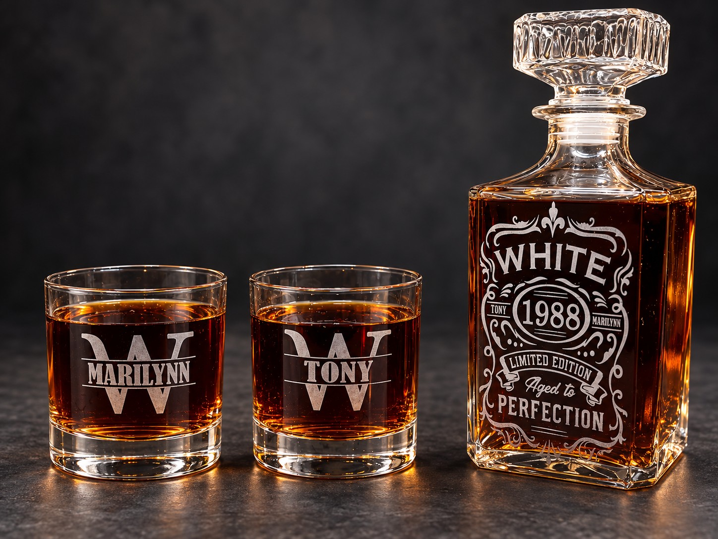 Personalized engraved whiskey decanter with two matching monogrammed rocks glasses