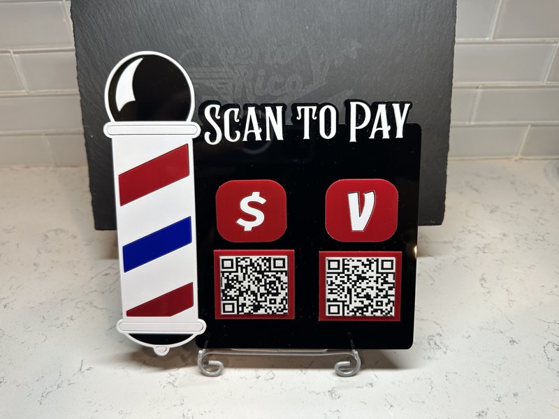 Barber pole themed acrylic scan-to-pay sign with payment QR codes
