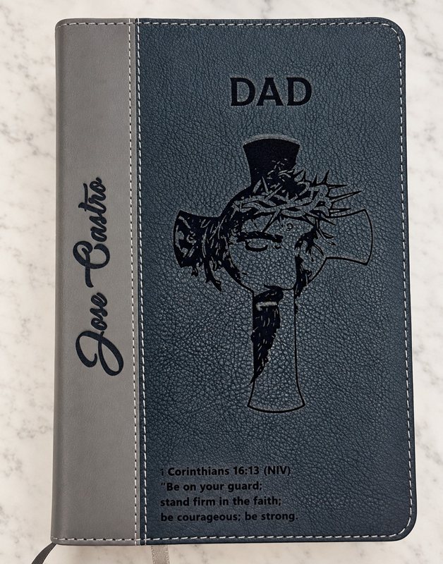 Two tone Bible engraved Dad and Jose Castro with cross artwork and 1 Corinthians 16:13