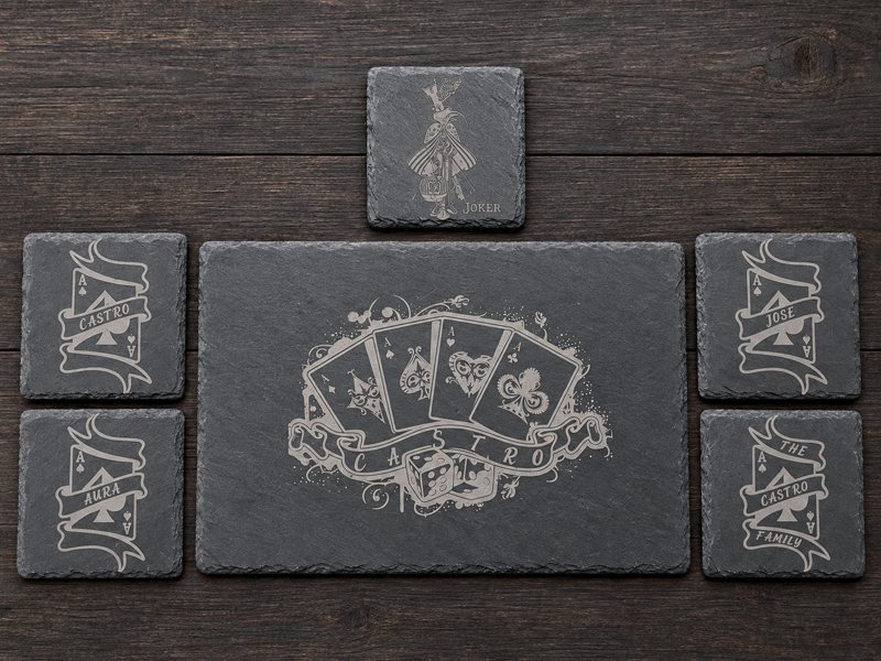 Custom engraved slate charcuterie serving board and five personalized playing-card themed coasters